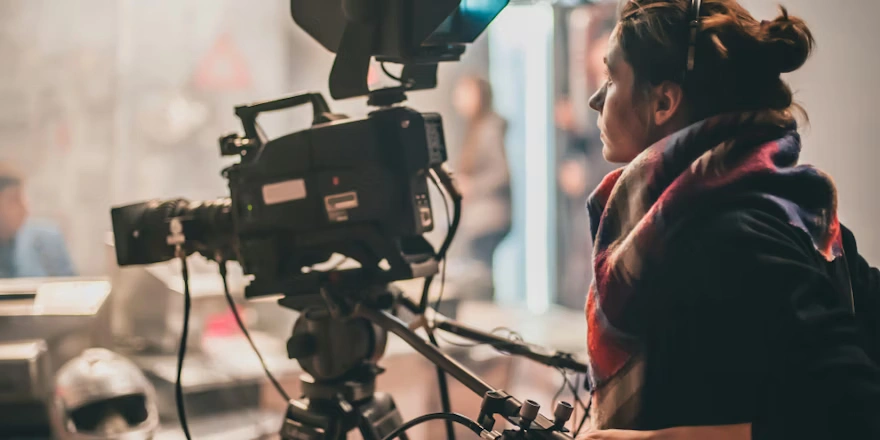 woman-with-camera.webp