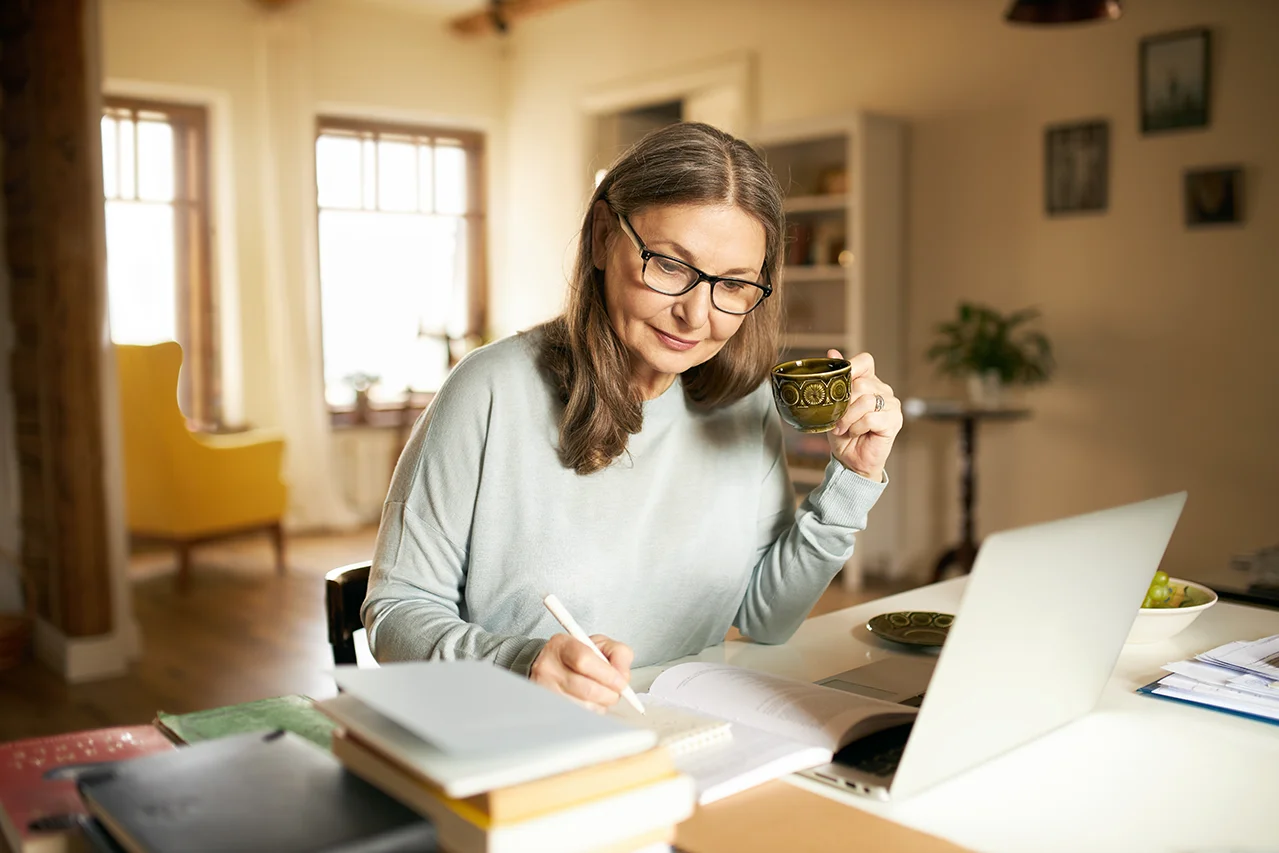 woman-at-desk.webp