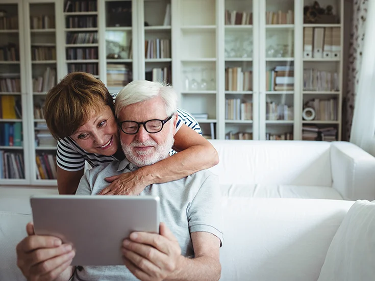 couple-watching-tablet.webp